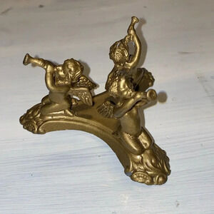Small vintage Brass horn playing angel cherub orb candle holder stand